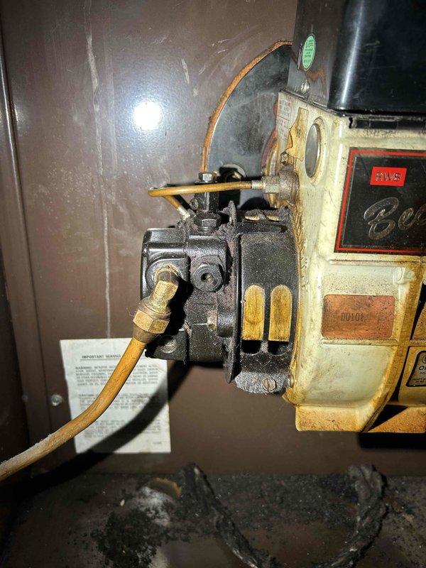 Responded to no-heat call for an aging oil furnace (65+ year old home). Diagnosed intermittent ignition failure in the primary oil control system. Found significant wear on Honeywell limit control switch and deteriorated components with visible oxidation. Replaced faulty igniter and primary control, restored proper cycling sequence, and verified consistent ignition. System now operating normally, providing reliable heat.