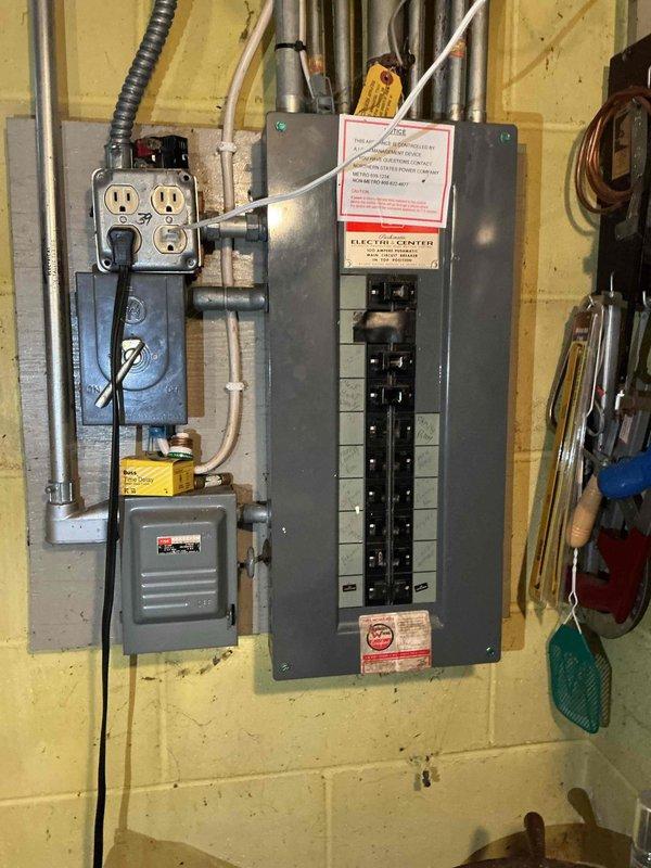 Responded to service call regarding Moen smart shower thermostat malfunction. Customer reported excessive hot water temperature making shower unusable. Diagnosed control panel failure as confirmed by prior Moen technical support. Documented existing HVAC system and electrical panel for reference. Advised customer on replacement options for discontinued unit. Customer is proceeding with ordering new control panel directly from manufacturer.