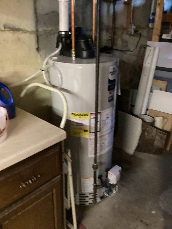 Responded to service call for clogged bathroom lavatory drain. Customer had previously removed and cleaned the trap without resolving the issue. Attempted to clear main drain line using snake, but obstruction could not be removed. Referred customer to specialized drain cleaning company for further assistance.