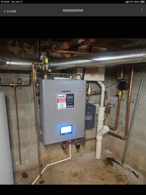 Responded to warranty call for newly installed boiler experiencing zone heating issues. Diagnosed air lock in one apartment and a control valve pin stuck halfway closed. Resolved by bleeding air from the system and freeing the control valve pin with lubrication (WD-40). Verified proper heating function in the affected apartment, with no issues reported in other units.