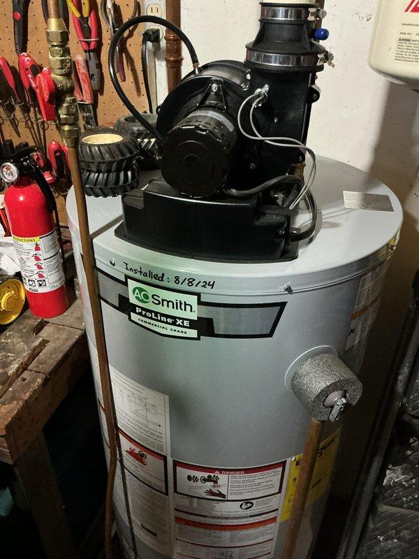 Responded to service call for kitchen sink issues. Discovered galvanized drain pipe had rotted through wall, causing leakage. Replaced deteriorated drain assembly and one faulty supply shut-off valve to restore proper functionality. Documented extensive water damage to surrounding wall area requiring future attention.