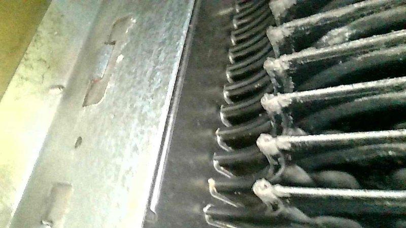 Performed $29 tune-up on system. Discovered frozen evaporator coil caused by clogged secondary drain and active water leak. Noted failing inducer motor and hot surface ignitor. Recommended full system replacement due to repair costs and equipment age. Discussed upstairs bedroom cooling issues with customer and explained additional diagnostic options.