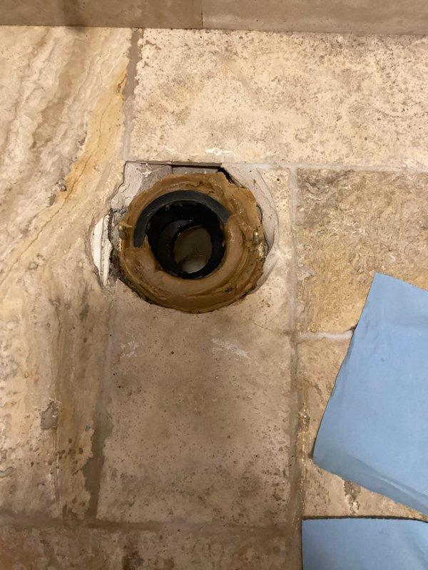 Responded to service call for sewer gas odor and water line leak. Upon inspection, identified a cracked toilet flange causing toilet leakage. Accessed ceiling area to inspect plumbing infrastructure and verify extent of water damage. Provided customer with estimate for flange replacement.