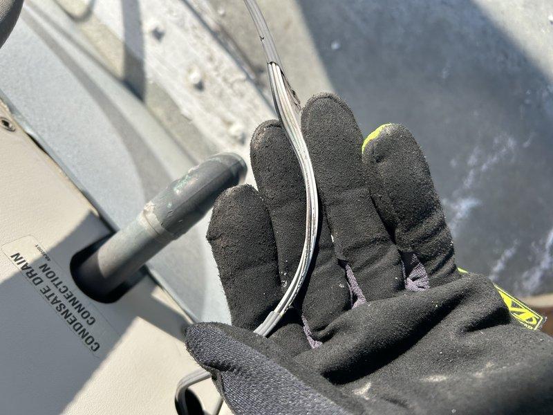 Diagnosed RTU failure to operate heating function. Verified voltage at thermostat heat terminal but observed no inducer motor operation despite proper voltage supply to motor. Determined inducer motor requires replacement. Noted and documented UV damage to external wiring harness, which was reported to maintenance personnel. Customer requested pricing for both inducer motor replacement and complete unit replacement options.