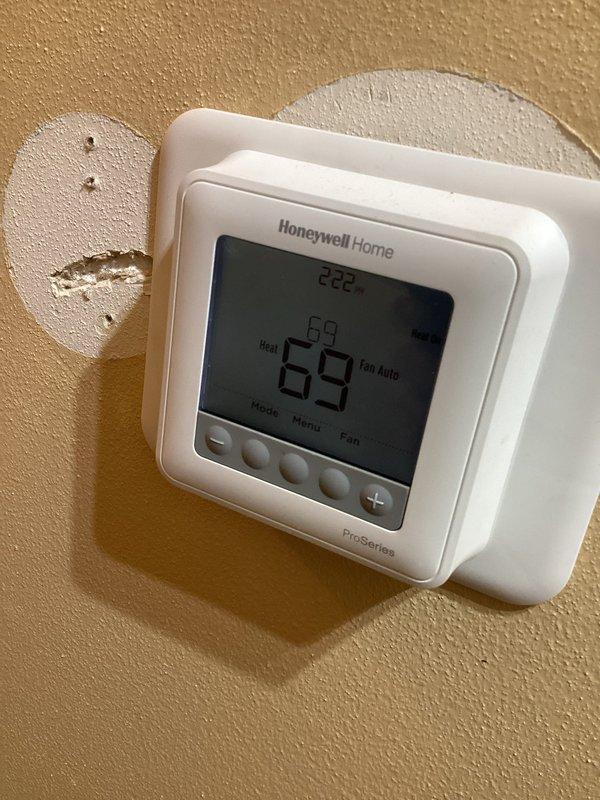 Responded to no heat call for 2-year-old system under warranty. Diagnosed furnace in soft lockout condition due to clogged air filter. Replaced filter, checked igniter, flame sensor, inducer, pressure switch, condensate drain, venting, outdoor terminations and burners. Cycled system to verify proper operation; unit now functioning normally.