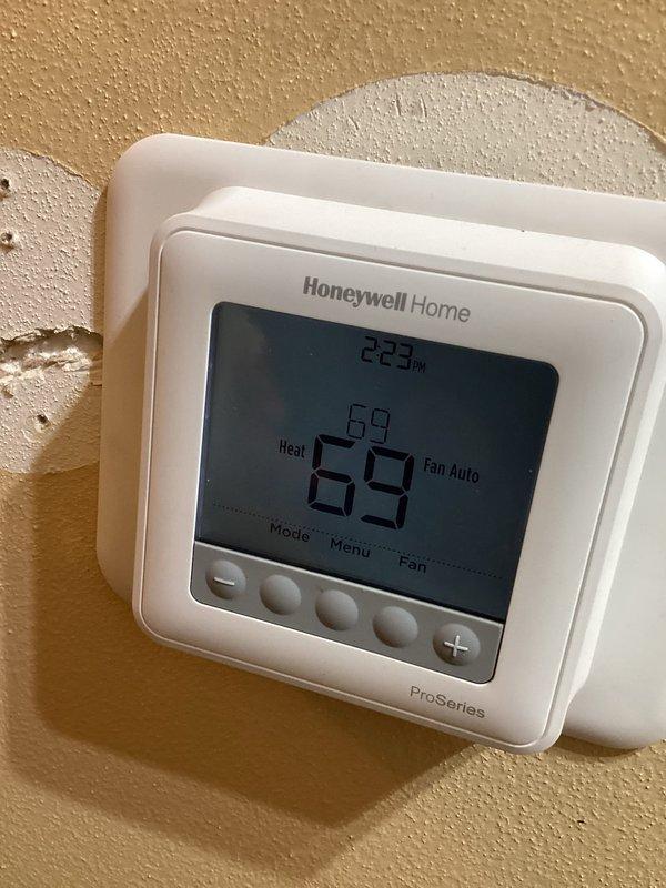 Responded to no heat call for 2-year-old system under warranty. Diagnosed furnace in soft lockout condition due to clogged air filter. Replaced filter, checked igniter, flame sensor, inducer, pressure switch, condensate drain, venting, outdoor terminations and burners. Cycled system to verify proper operation; unit now functioning normally.