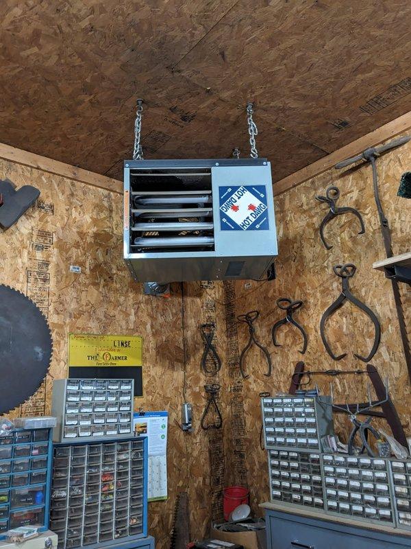 Responded to service call for Hot Dawg shop heater (10-15 years old) that was running but not producing heat. Upon arrival, customer had already performed preliminary cleaning. Diagnostic testing revealed no operational issues after multiple test cycles. System is now functioning properly with adequate heat output.