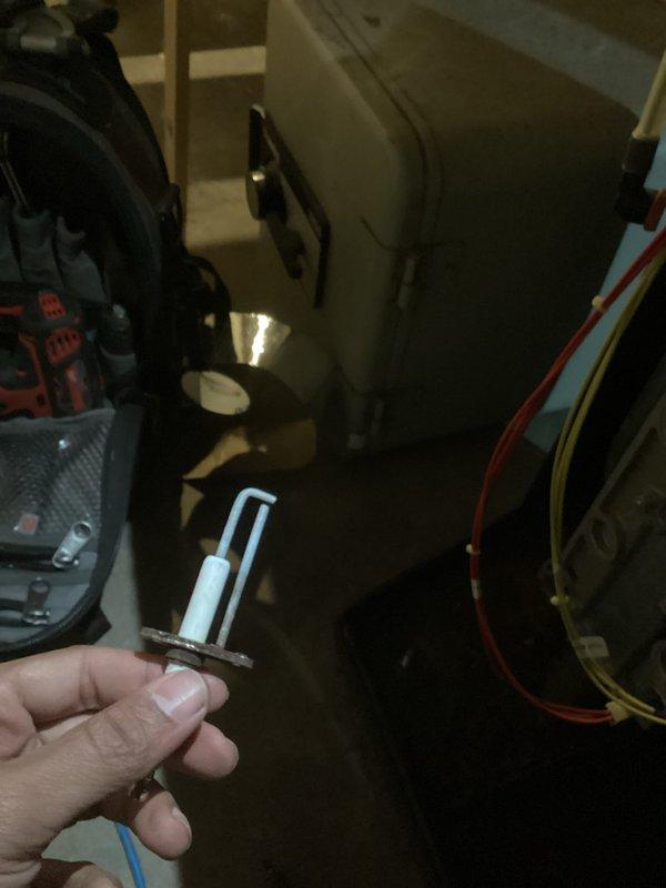 Responded to no heat call for 20-year-old boiler system. Upon inspection, detected carbon monoxide leakage (40-45 ppm) at the heat exchanger, indicating unsafe operating conditions. Cleaned flame sensor and temporarily restored ignition, but recommended immediate system shutdown due to compromised heat exchanger integrity and advanced equipment age. Scheduled replacement consultation as repair not advisable given system condition and safety concerns.