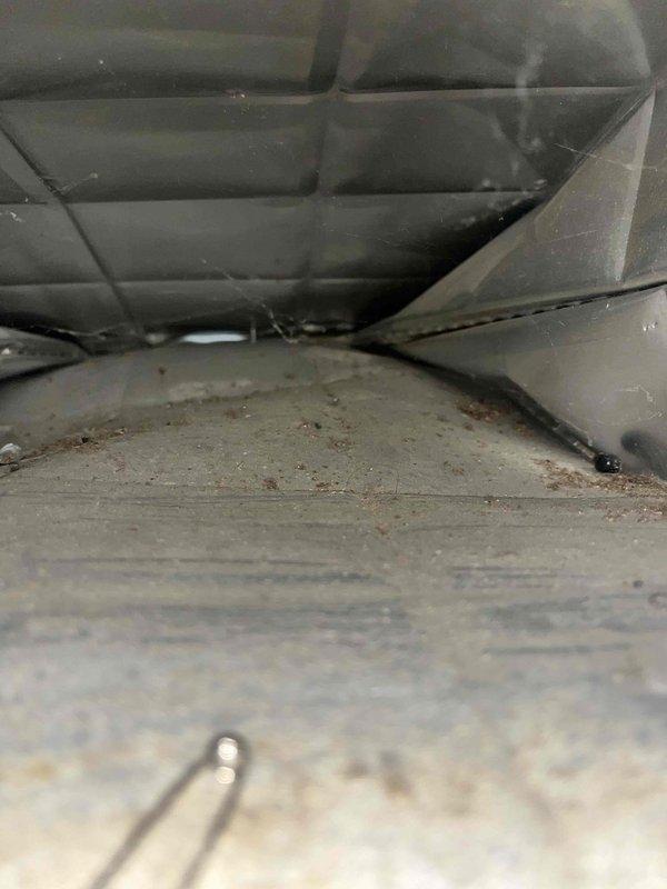 Inspected furnace in response to noise complaints and heating failure. Internal examination of ductwork revealed multiple collapsed sections with significant dust accumulation, restricting proper airflow. Advised customer that blower motor is beginning to fail due to restricted airflow conditions and recommended complete ductwork replacement prior to motor replacement to prevent damage to new components and ensure proper system function.