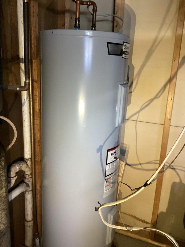 Responded to service call for oil furnace leaking around filter area. Diagnosed issue as insufficiently tightened bleed screw from previous service. Tightened bleed screw properly and cleaned up oil spillage from floor to resolve the leak.