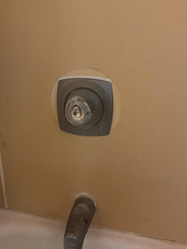 Replaced broken Moen crystal handle on shower/tub valve that was preventing proper operation and temperature control. Located and installed new compatible handle, restoring full functionality to the fixture.