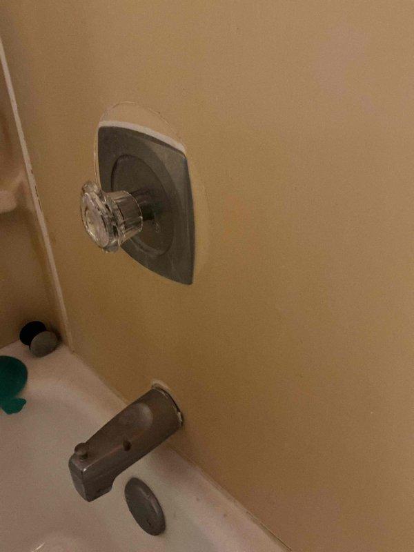 Replaced broken Moen crystal handle on shower/tub valve that was preventing proper operation and temperature control. Located and installed new compatible handle, restoring full functionality to the fixture.