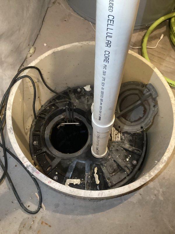 Diagnosed and serviced malfunctioning sump pump system in basement mechanical room. Identified that the float was obstructed by debris causing pump failure after GFI reset. Thoroughly cleaned out sump pit, properly repositioned the float mechanism, and restored normal pump operation. Additionally, pulled and reset a leaking basement toilet that had been affected by the backup.