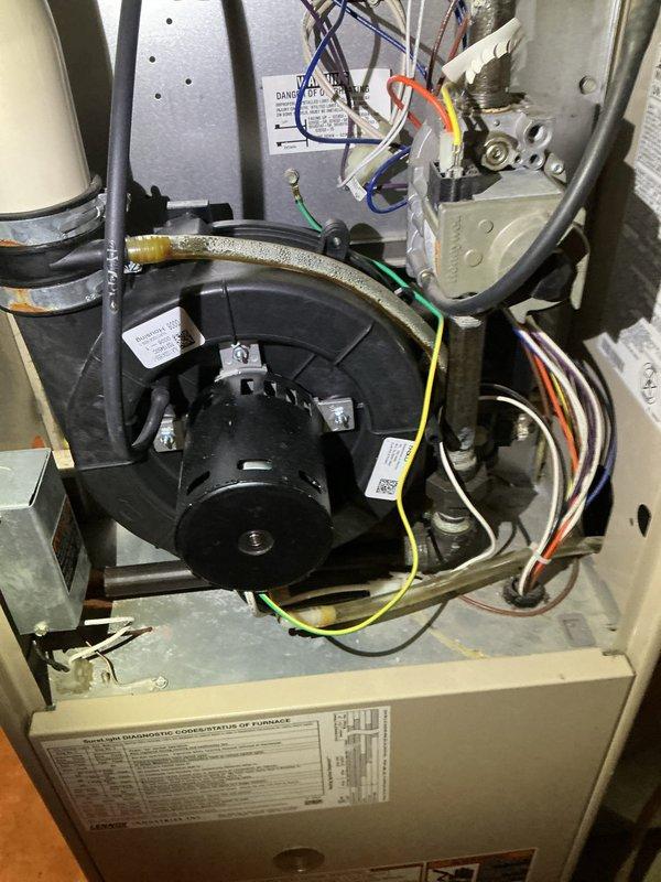 Performed scheduled bi-annual maintenance on 24-year-old Lennox high-efficiency furnace. Replaced air filter and conducted comprehensive inspection, noting some spots on heat exchanger that are not penetrating at this time. System appears operational with recent draft motor replacement from previous year.