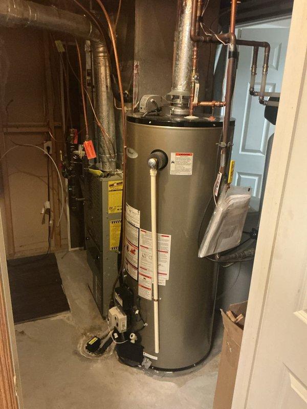 Addressed kitchen sink leak affecting basement. Removed garbage disposal and completely repiped under-sink drainage system with new strainers. Corrected improper uphill drain configuration and replaced faulty washer that were causing water to back up and leak through to basement.