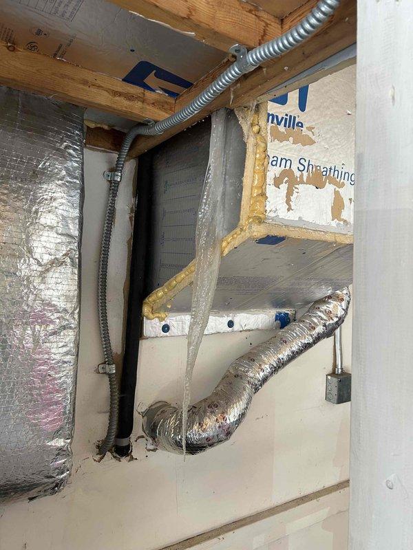 Responded to follow-up service call for no heat issue. Diagnosed frozen condensate drain line as the cause of system failure. Installed temporary drain line to restore heating function. Advised homeowner this is a temporary solution and discussed preventative measures. Recommended consideration of replacing with non-condensing furnace or conditioning the garage space to prevent future freezing issues.