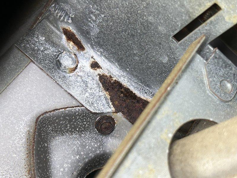 Responded to service call for noisy furnace operation. Diagnosed failing inducer motor causing squealing noise during operation. Completed replacement of inducer motor along with preventative maintenance including burner replacement, rollout switch installation, and blower wheel cleaning. Noted significant rust on internal components and confirmed 70.9° temperature reading during operational testing.