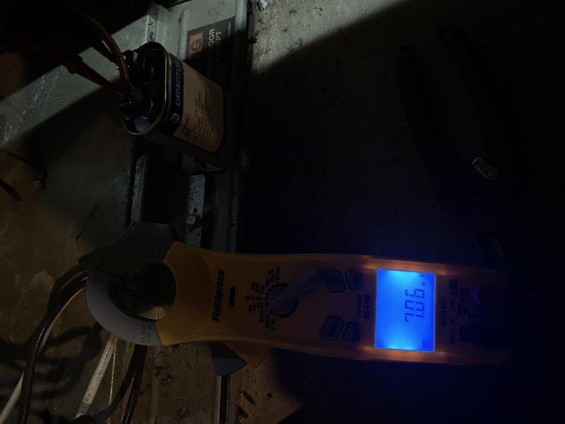 Responded to service call for noisy furnace operation. Diagnosed failing inducer motor causing squealing noise during operation. Completed replacement of inducer motor along with preventative maintenance including burner replacement, rollout switch installation, and blower wheel cleaning. Noted significant rust on internal components and confirmed 70.9° temperature reading during operational testing.