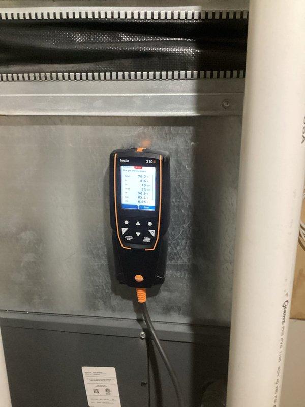 Performed routine furnace tune-up on 5-year-old system at seller's request prior to home closing. Conducted electrical testing with clamp meter showing normal amperage readings (0.36A) and used Testo 310i analyzer to verify combustion efficiency and safety parameters. All components functioning properly with no issues found; system is operating safely and efficiently.
