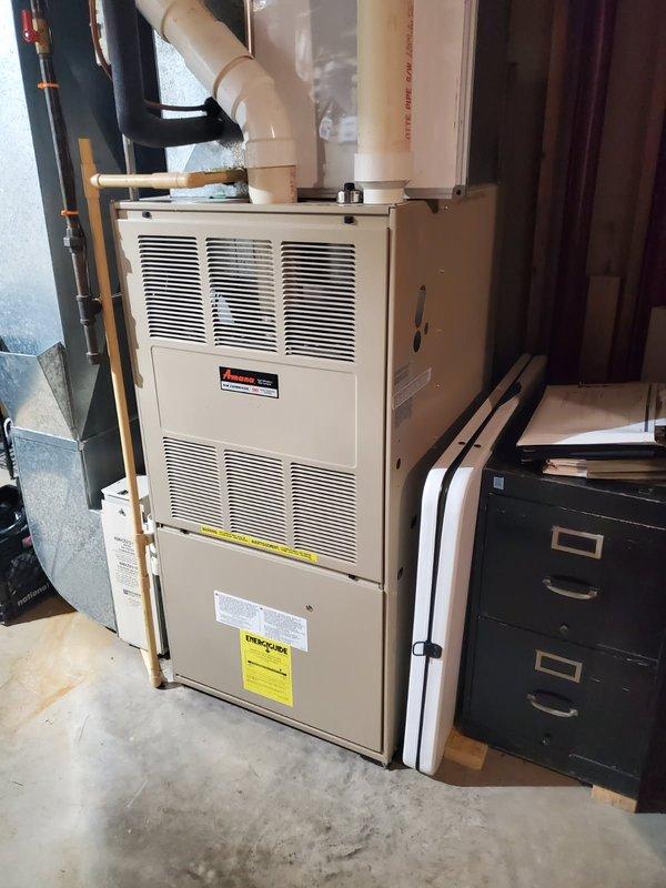 Responded to no heat call for Amana LP furnace. Diagnosed completely plugged furnace filter caused by ultrasonic humidifiers as source of issue. Reset limit switch after filter replacement, restoring normal operation. Performed visual inspection of heat exchanger and burners, confirmed system is in good working condition for its age. Advised customer about proper humidification options.