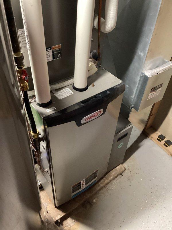 Responded to customer call regarding furnace not maintaining set temperature. Diagnostic inspection revealed system was operating correctly upon arrival, with proper heating cycle and shutdown. Identified failed transformer for UV light system. Recommended replacement of both transformer (under warranty) and 3-year-old UV bulb. Advised customer on benefits of maintaining steady temperature settings rather than programmed temperature reductions. All temperature readings and furnace operation verified normal upon completion of service.