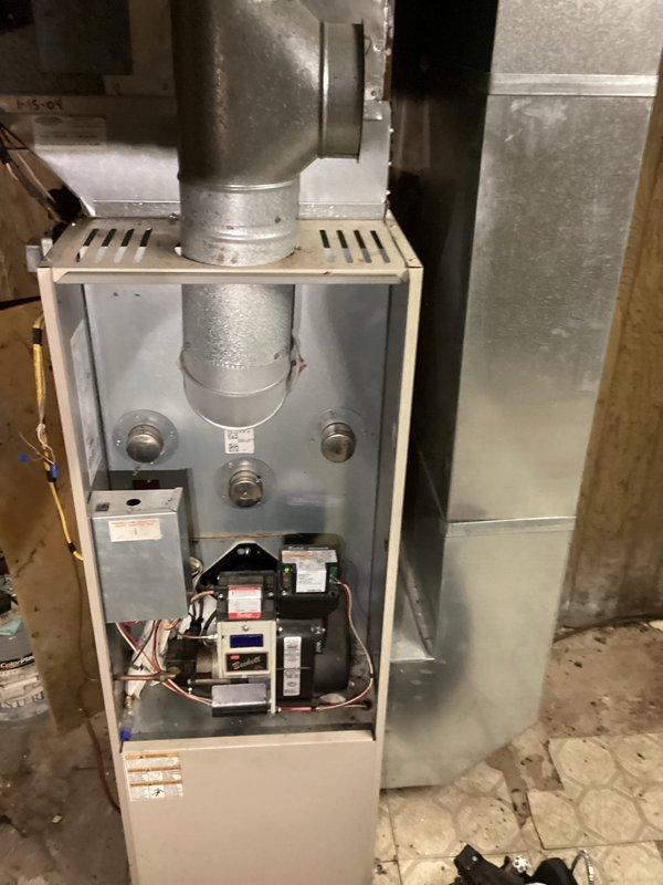 Responded to no-heat call at residence with dual heating system (oil and propane furnaces). Diagnosed issues: propane furnace had frozen vent pipe and oil furnace required bleeding. Successfully repaired frozen vent pipe on propane unit, bled air from oil furnace lines, and restored operation of both systems. Customer interested in replacing oil furnace with new propane system.