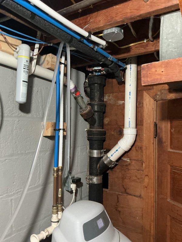 Responded to service call for bathroom backup issue. Upon inspection, found toilet was clogged causing entire bathroom drainage system to back up. Provided customer with recommendation to snake toilet to clear blockage and restore proper drainage function.