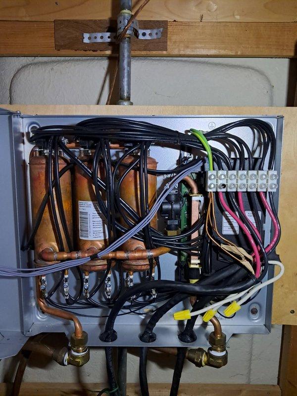 Responded to service call for Stiebel Eltron Tempra tankless water heater that was not producing hot water despite having power. Diagnostic testing revealed flow sensor failure likely caused by recent freezing conditions. Installed requested shut-off valve and ordered replacement flow sensor. Provided customer with estimate for parts and follow-up service to complete repair.