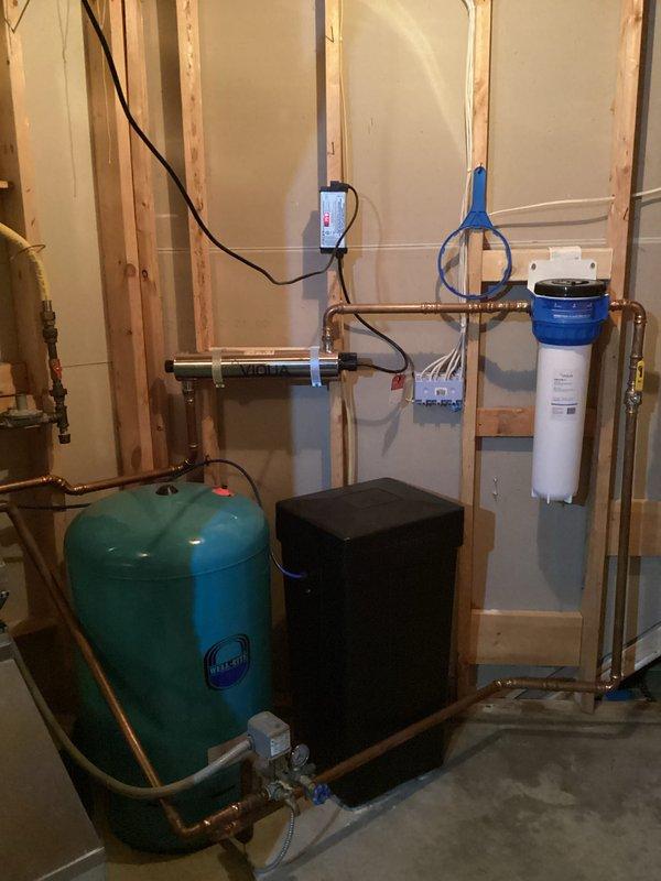 Responded to service call for water treatment system maintenance. Diagnosed reduced water pressure issue and replaced iron filter cartridge in basement filtration system. System now functioning properly with restored pressure levels.