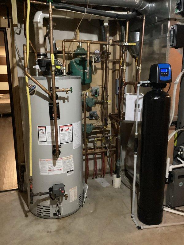 Responded to service call for water treatment system maintenance. Diagnosed reduced water pressure issue and replaced iron filter cartridge in basement filtration system. System now functioning properly with restored pressure levels.