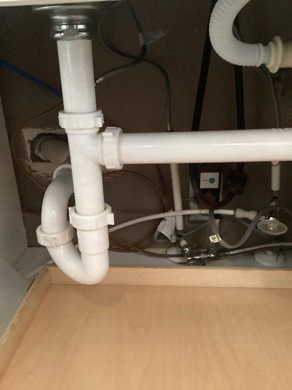 Responded to service call for a leaking Kohler kitchen faucet. Customer provided replacement cartridge which was successfully installed, resolving the water leak issue under the sink. Verified proper operation after installation with no further leaks observed.