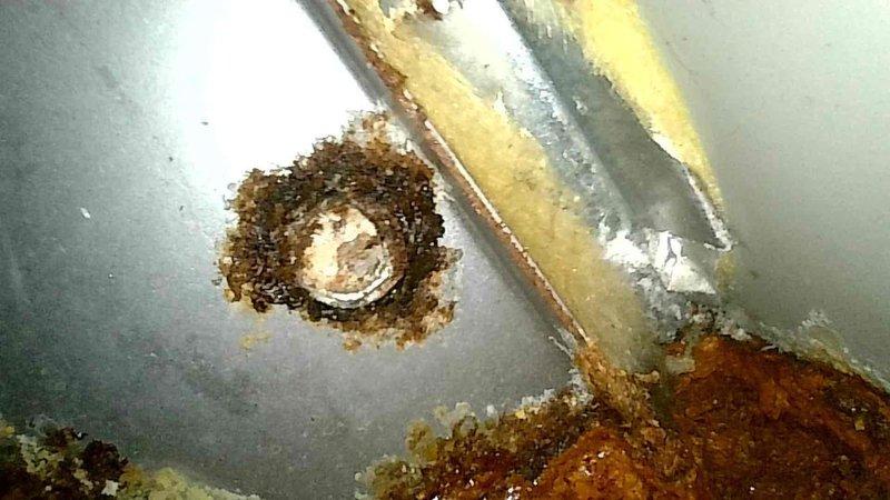 Diagnosed non-functioning furnace with multiple critical failures: cracked heat exchanger with primary cell damage, cracked collector box causing water leakage throughout unit, and failed control board preventing inducer operation. Tagged unit due to compromised sealed chambers. Provided customer with temporary space heaters and arranged for advisor visit to discuss replacement options given the 10-year-old unit's condition.