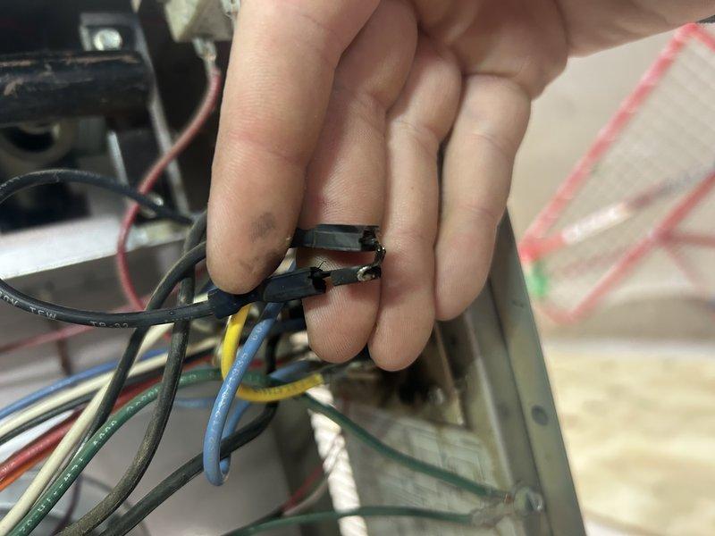 Responded to service call for non-functioning garage heater. Diagnosed multiple issues including a faulty sequencer failing to send 120V to indoor fan despite receiving 27V across the coil, and a loose solder connection on the control board. During troubleshooting, the control board experienced an electrical short. Unit requires replacement of both control board and sequencer for proper operation.