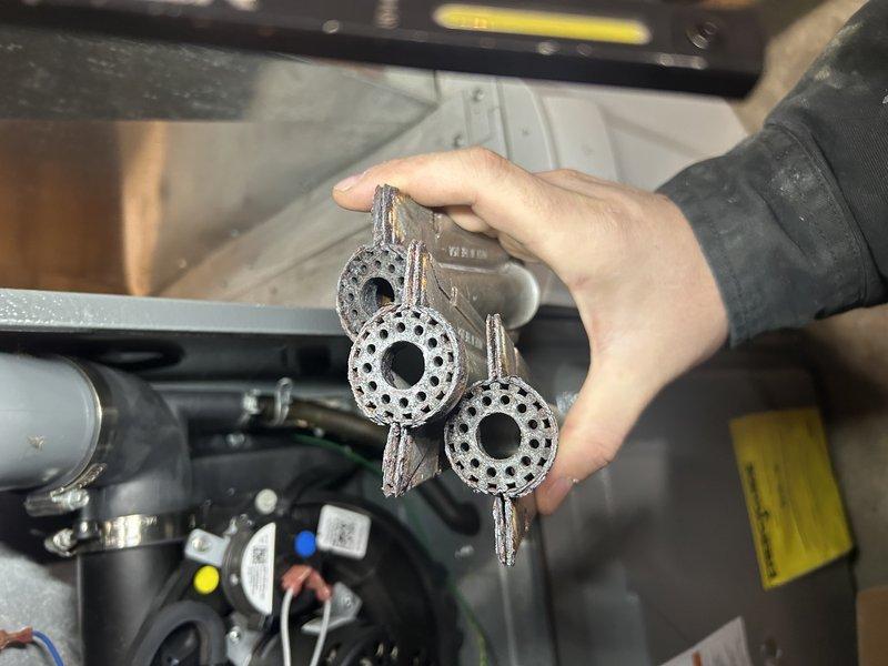 Completed furnace repair by replacing burner assembly. Successfully installed new burners, verified proper operation, and confirmed appropriate gas pressure. All systems now functioning correctly.