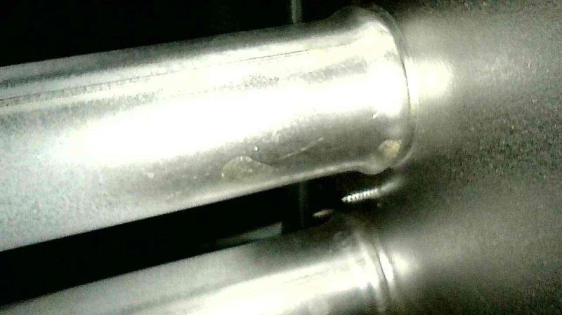 Responded to no heat complaint on a system experiencing intermittent operation. Diagnosed failed ignition sequence with flames extinguishing shortly after lighting. Found dirty filter restricting airflow and debris accumulation on flame sensor. Cleaned flame sensor, replaced filter, and verified proper system operation. Noted secondary heat exchanger and evaporator coil require cleaning due to significant buildup, and inducer motor drawing high amperage with excessive noise indicating potential failure.