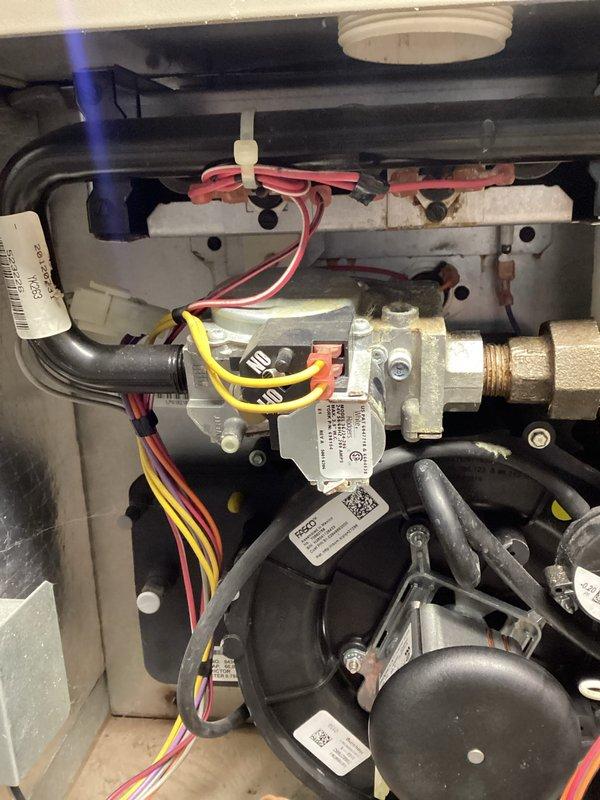 Responded to no heat complaint and installed new draft combustion inducer assembly. Upon testing, discovered failed gas valve and non-operational condensate pump. Inspected heat exchanger which showed areas of concern but no compromises. Communicated findings to landlord and recommended obtaining estimates for additional repairs given unit's age and condition, with follow-up appointment scheduled.