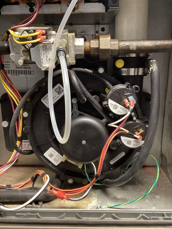 Responded to no heat complaint and installed new draft combustion inducer assembly. Upon testing, discovered failed gas valve and non-operational condensate pump. Inspected heat exchanger which showed areas of concern but no compromises. Communicated findings to landlord and recommended obtaining estimates for additional repairs given unit's age and condition, with follow-up appointment scheduled.