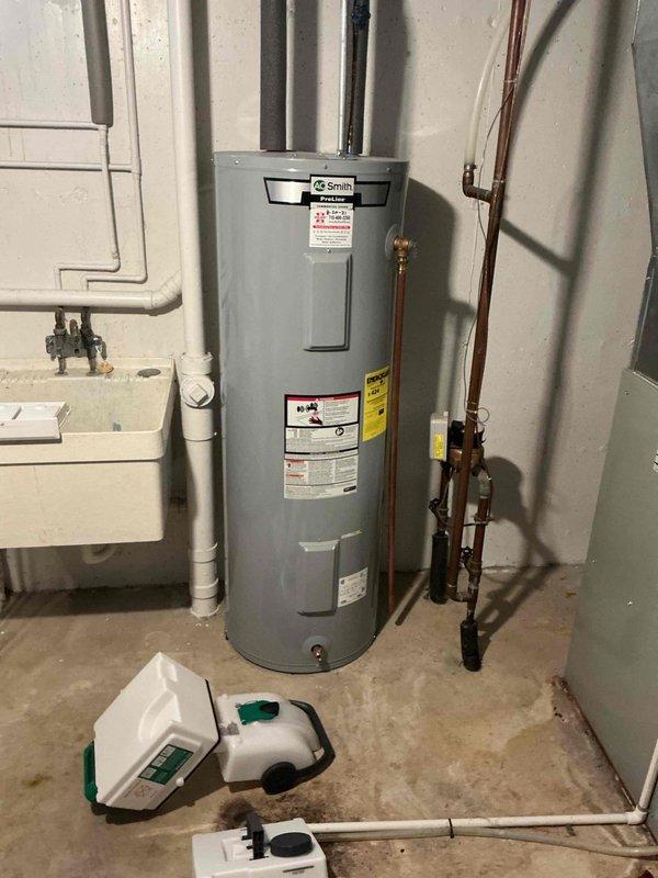 Responded to a callback regarding a leaking shower faucet. Diagnosed issue with shower dripping for approximately 10 minutes after shutdown, producing approximately one cup of water. Installed new shower arm and sprayer to address the problem. Demonstrated proper operation to customer, including how to perform short cycling procedure to minimize post-shutdown dripping.