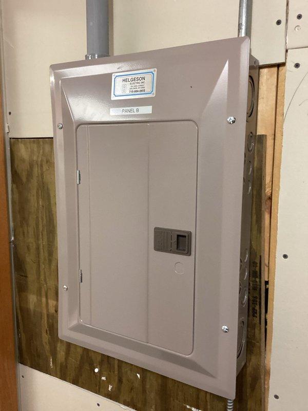 Diagnosed no heat condition on residential furnace with cold air blow. Found rusted burners causing rollout switch to trip. Inspected heat exchanger (no issues found). Replaced original components with stainless steel burner kit compatible with Goodman furnace. System tested for 20 minutes with proper operation and no rollout issues.