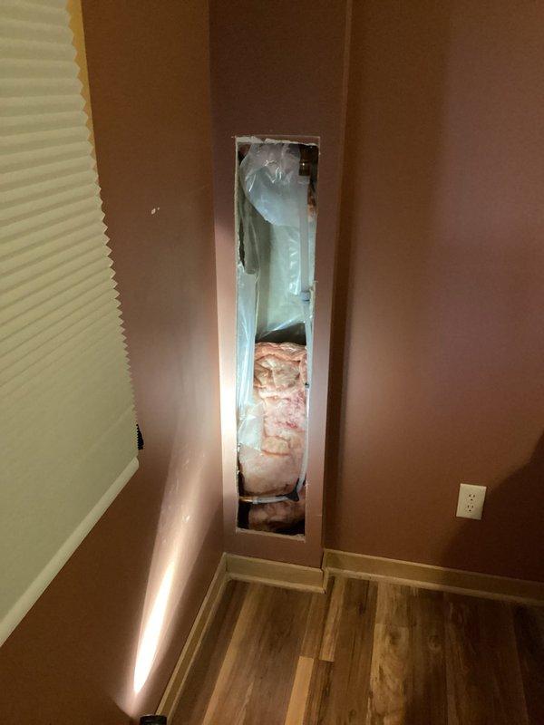 Located and repaired burst copper water line behind drywall that fed exterior hose bibb. Created access panel in wall, removed damaged section of pipe, and installed new copper pipe with replacement hose bibb. Ensured proper connection and tested for leaks before completion.