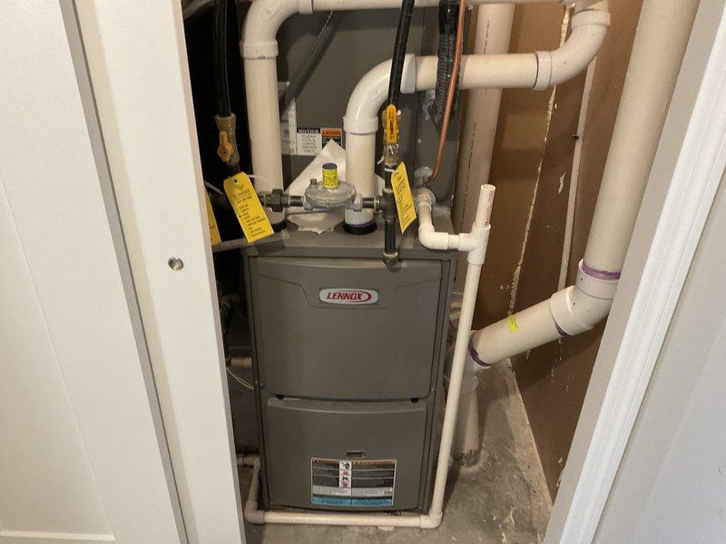 Diagnosed electric water heater with recurring tripping issue; found failed lower heating element and deteriorated upper element. Replaced both elements and thermostats, performed maintenance by vacuuming sediment buildup from tank bottom and flushing unit to restore proper operation.