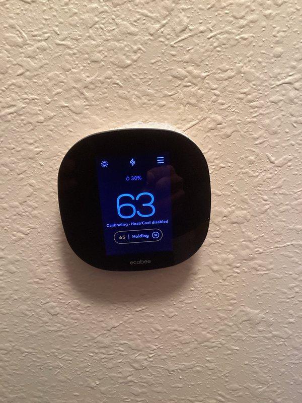 Performed furnace tune-up on unknown age FRP unit. System was overheating on high limit with red flames indicating combustion issues. Adjusted gas pressure, replaced filter, and noted absence of fresh air intake which could improve combustion efficiency. Inspected ecobee thermostat that was displaying calibration errors and sending error notifications to customer.