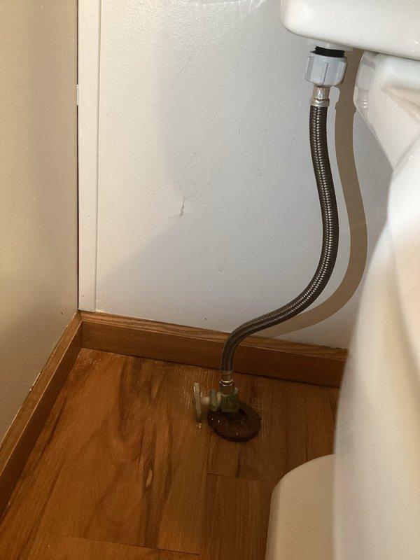 Installed customer-supplied American Standard double flapper toilet, connecting new braided stainless steel supply line to existing brass shutoff valve. Also installed customer-provided kitchen sink and faucet as requested. All fixtures were properly secured and tested for leaks after installation.