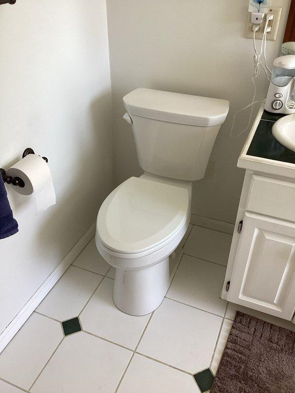 Successfully installed two ADA compliant, white, elongated toilets in the master bathroom and one standard elongated toilet on the first floor bathroom. Verified proper function and water flow of all units after installation.