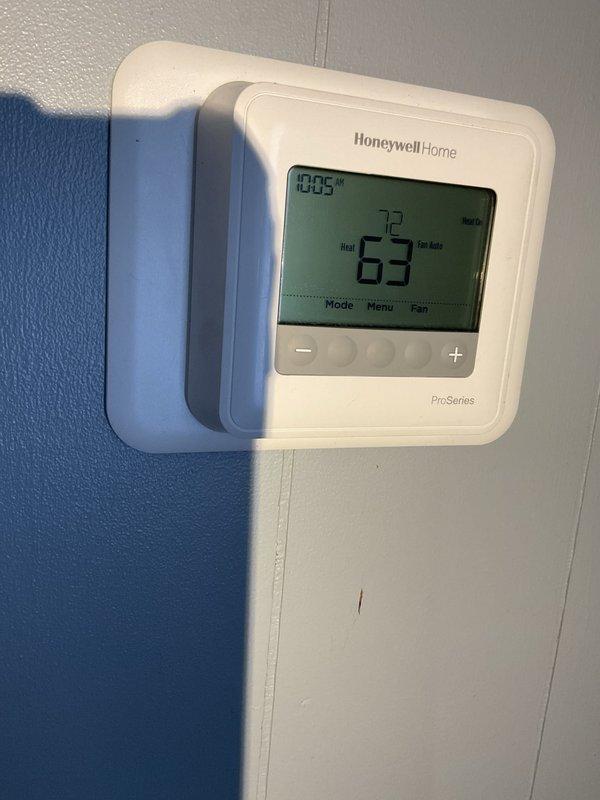 Diagnosed newly installed Revolv furnace short cycling issue where burners would ignite briefly then shut down while blower continued running without heat. Determined faulty limit switch in blower compartment was causing the problem. Temporarily installed manual reset limit to restore furnace operation and ordered replacement part.