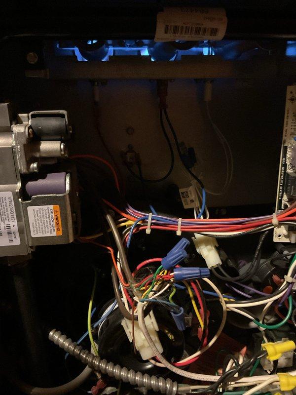 Responded to customer complaint of loud noises during furnace shutdown. Diagnosed partially blocked 15-inch filter causing bellows effect in return ductwork. Demonstrated noise source to homeowner and recommended adding insulation to dampen vibrations and more frequent filter changes. Inspected 10-year-old Gibson furnace system; observed normal blue flame pattern and proper electrical connections. Discussed system age and potential future replacement options with homeowner.