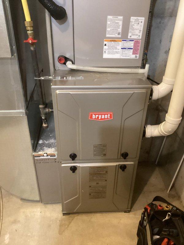 Responded to no heat service call for vacant property with Bryant furnace. Diagnosed pressure switch fault code and determined LP tank was completely empty, causing furnace to attempt ignition without fuel and resulting in gas smell throughout home. Shut down power to prevent continuous startup attempts and advised homeowner to refill LP tank to resolve heating issue.