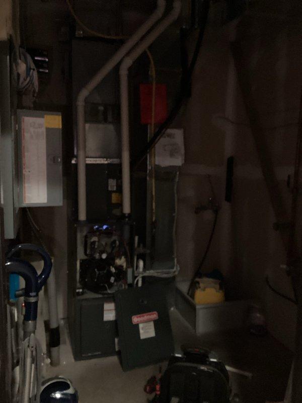 Responded to no heat call for an aging residential furnace located in a commercial building. Diagnostic testing revealed faulty ignitor preventing proper system operation. Replaced ignition component, restoring heat function. System returned to normal operation after repair.