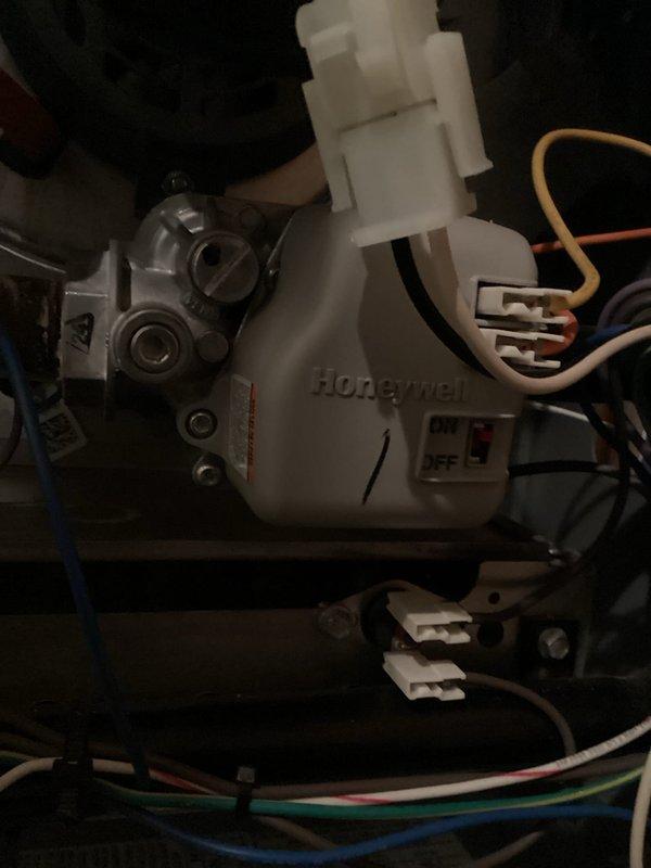 Diagnosed 10-year-old furnace with ignition failure due to faulty gas valve. Removed old component and installed new Honeywell gas valve, properly connecting all electrical terminals and gas fittings. System now operating correctly with proper ignition sequence and heat output; customer enrolled in rewards program.