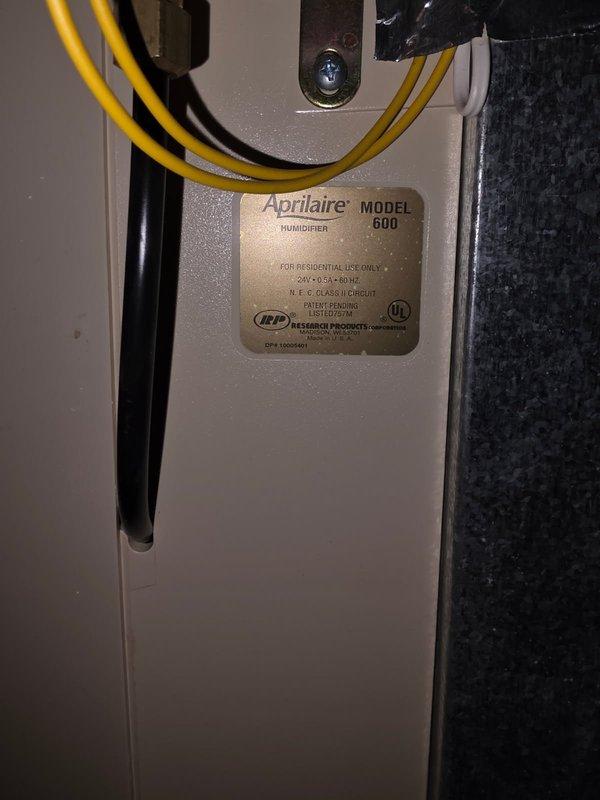 Responded to service call for non-functioning Aprilaire humidifier. Inspection revealed severely clogged humidifier pad causing water leakage due to improper drainage. Replaced the #35 filter, then test operated the system for 20 minutes. Humidifier now functioning properly with no leakage issues.